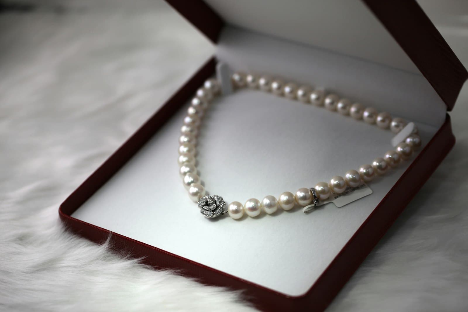 Placeholder photograph of a small gold accessory