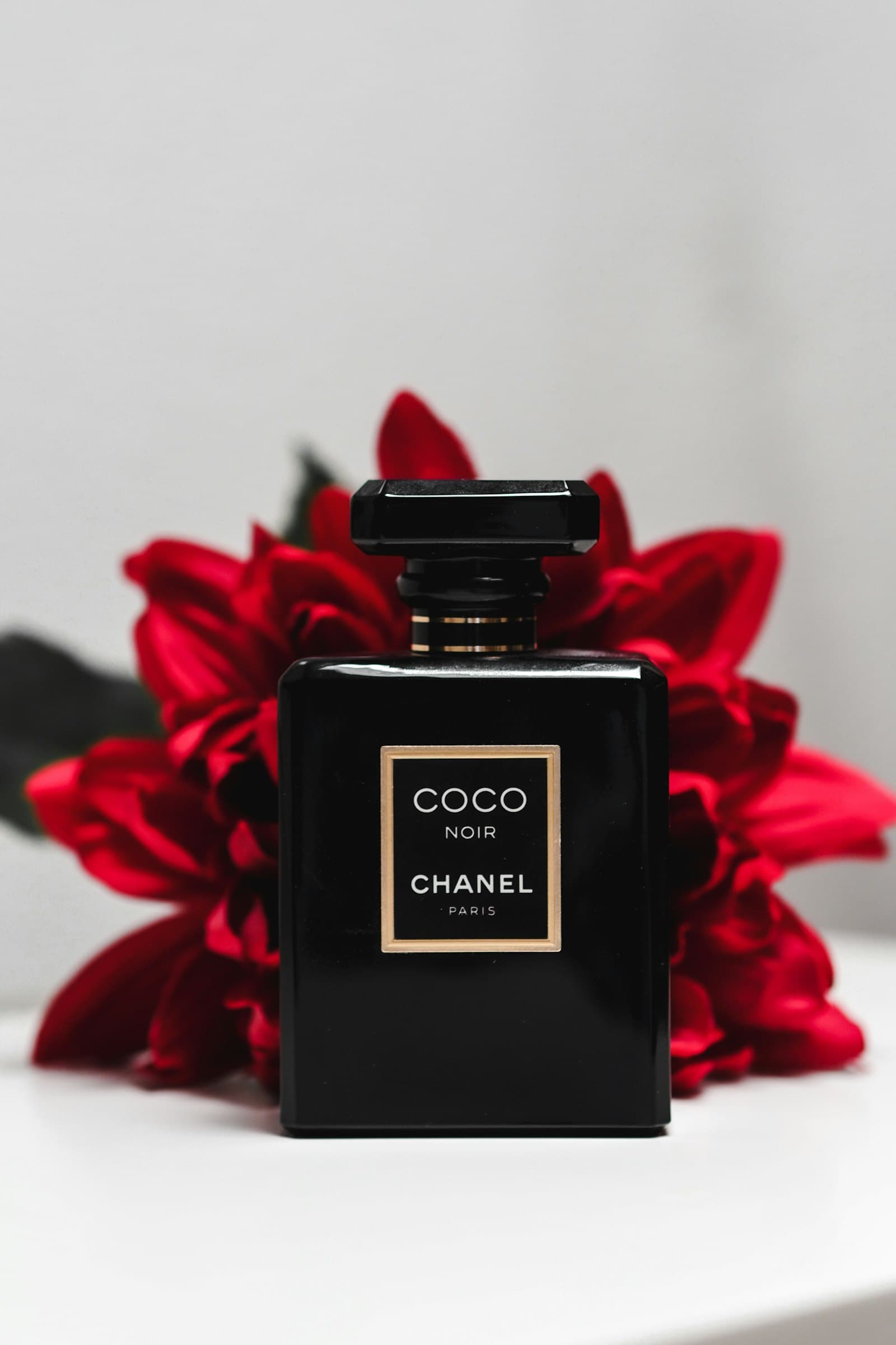 Placeholder photograph of a clear glass perfume bottle