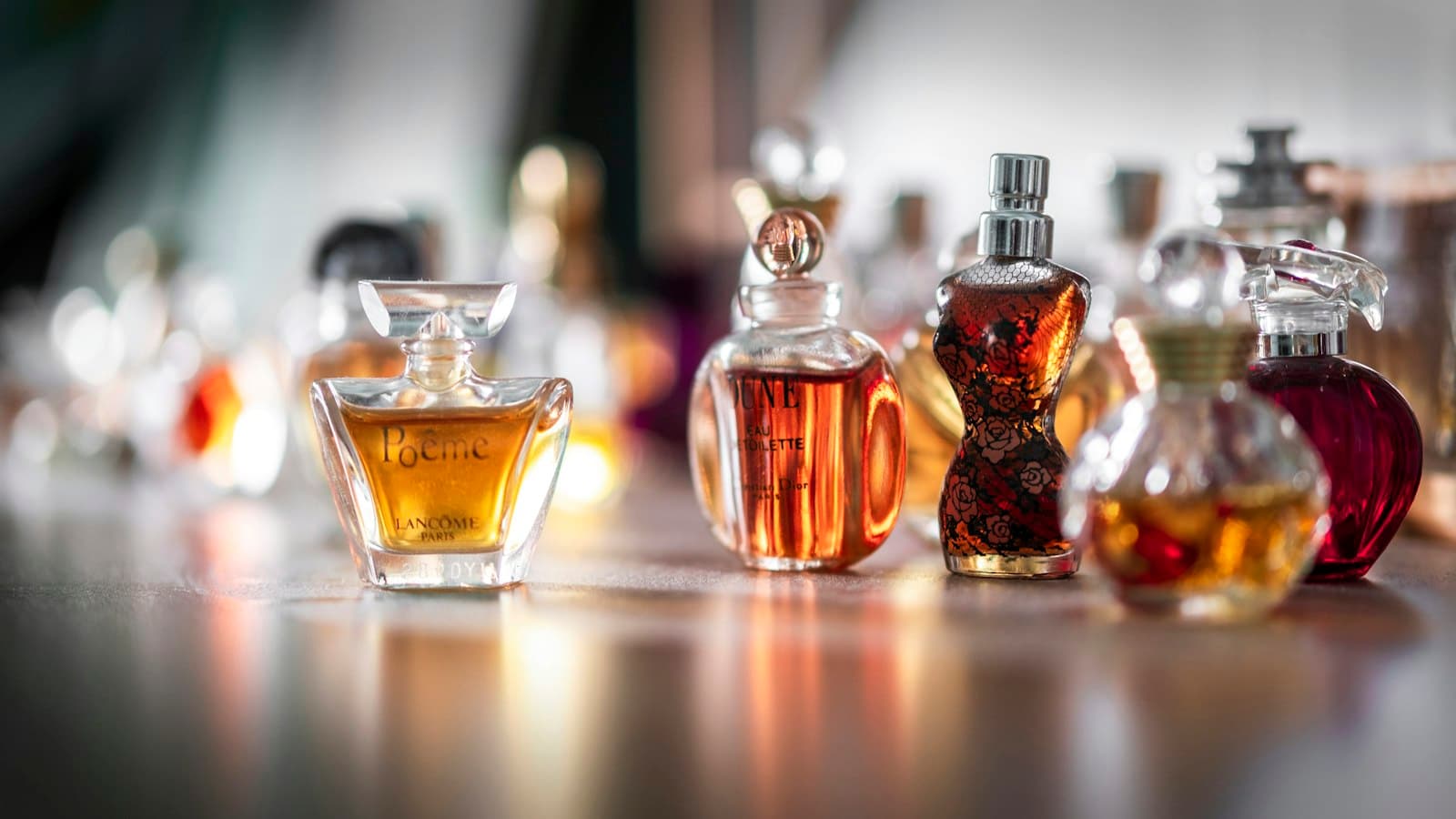 Placeholder photograph of a gold perfume bottle