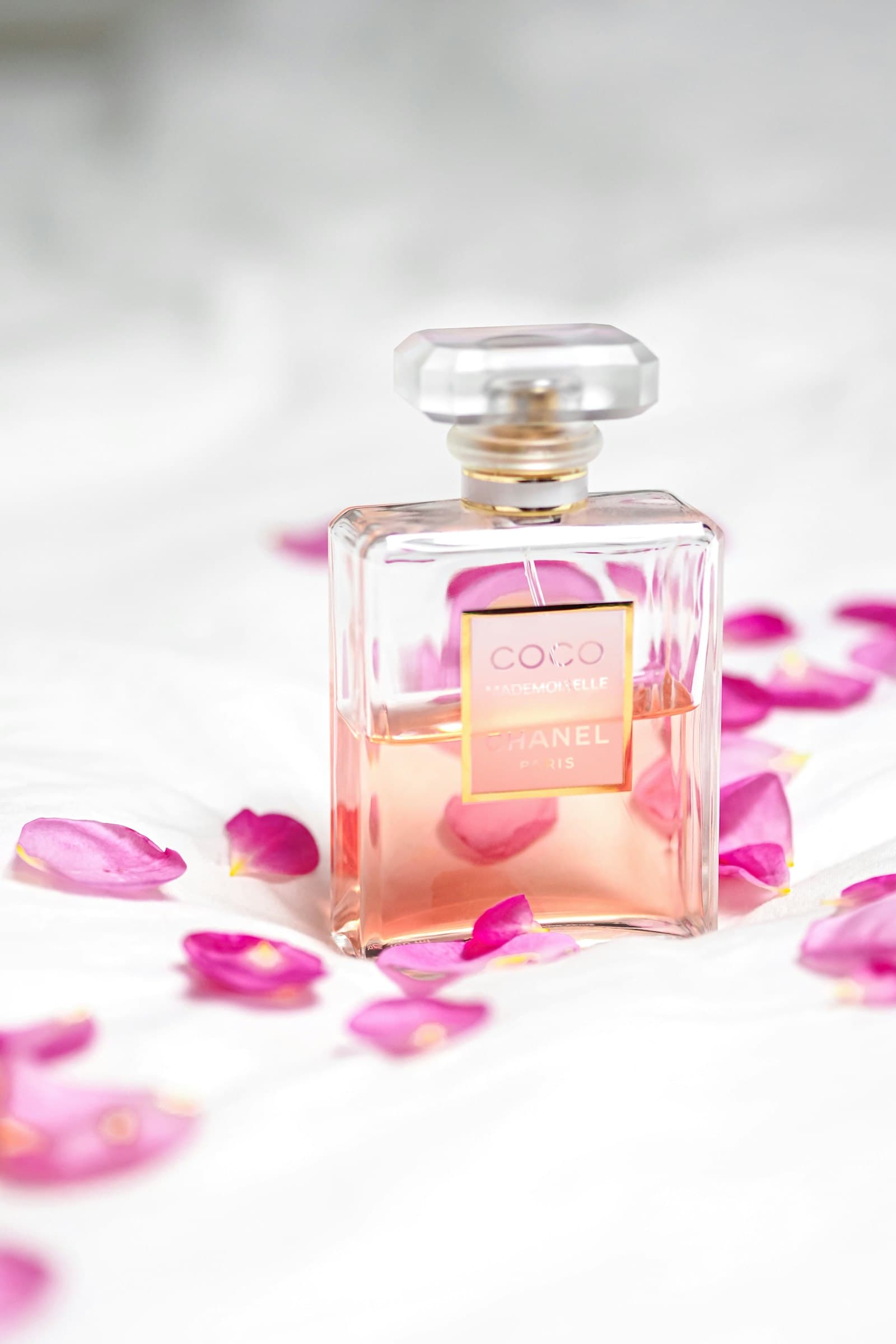 Placeholder photograph of a perfume bottle on marble